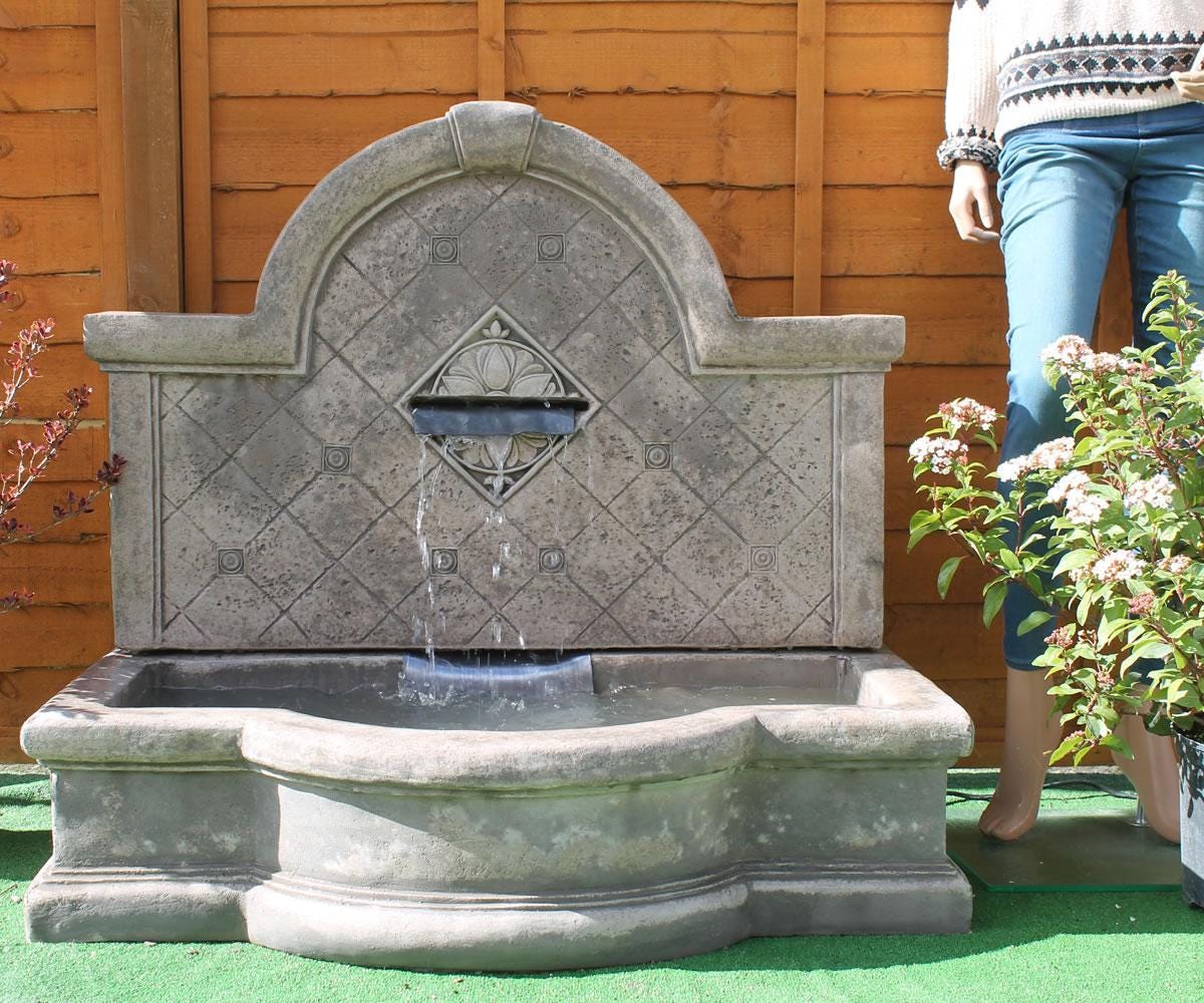 Add Calm and Character to Your Setting with the Tapas Wall Fountain